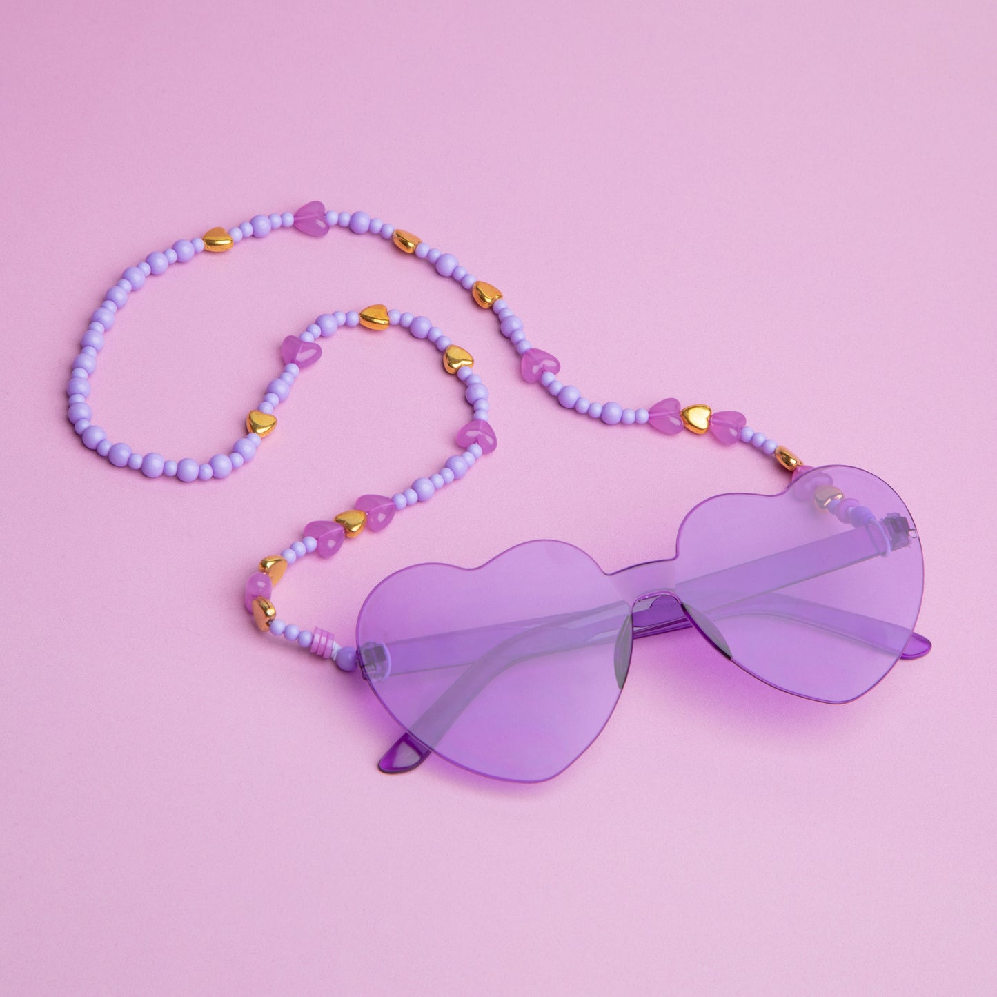 Sunglasses with a beaded chain.