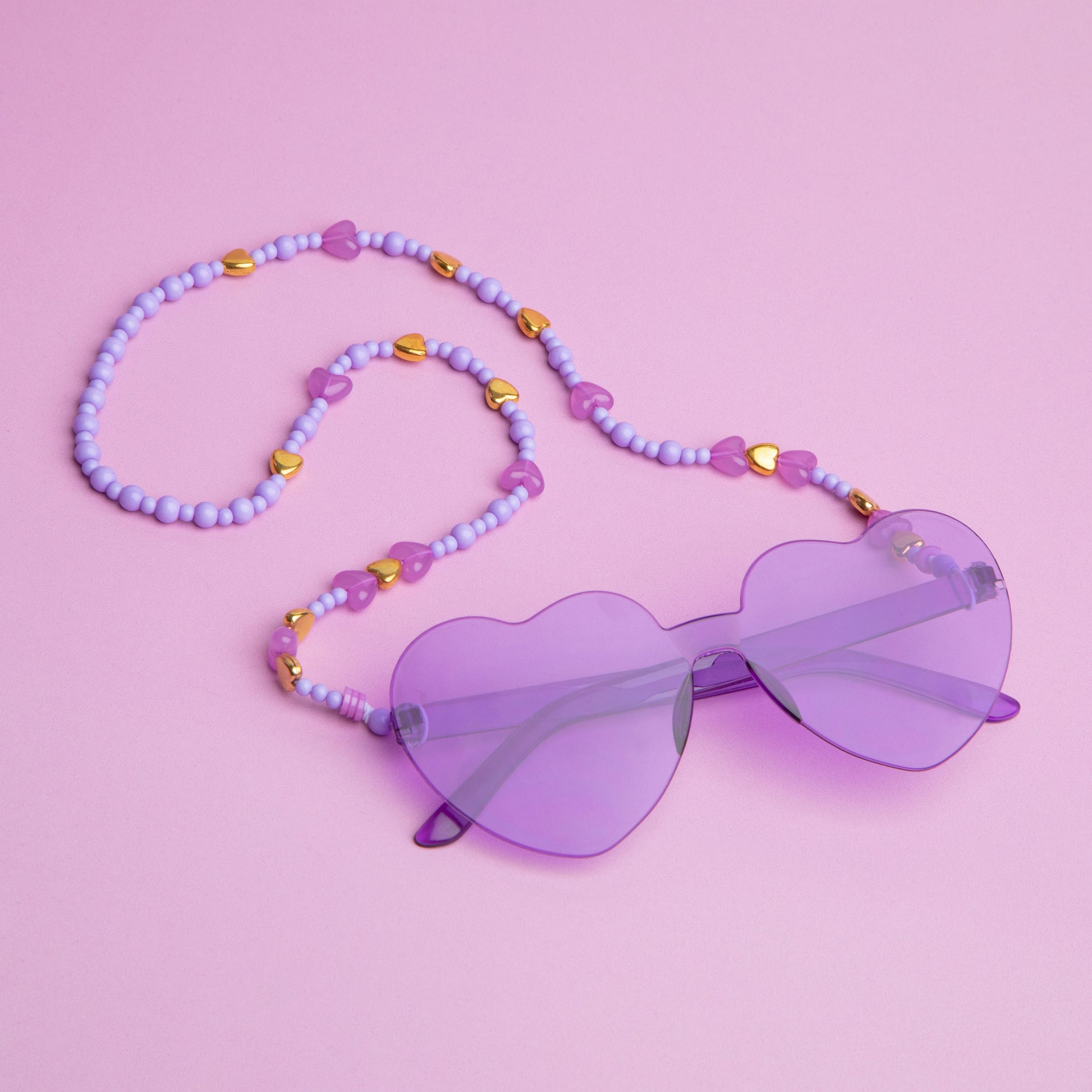 Sunglasses with a beaded chain.
