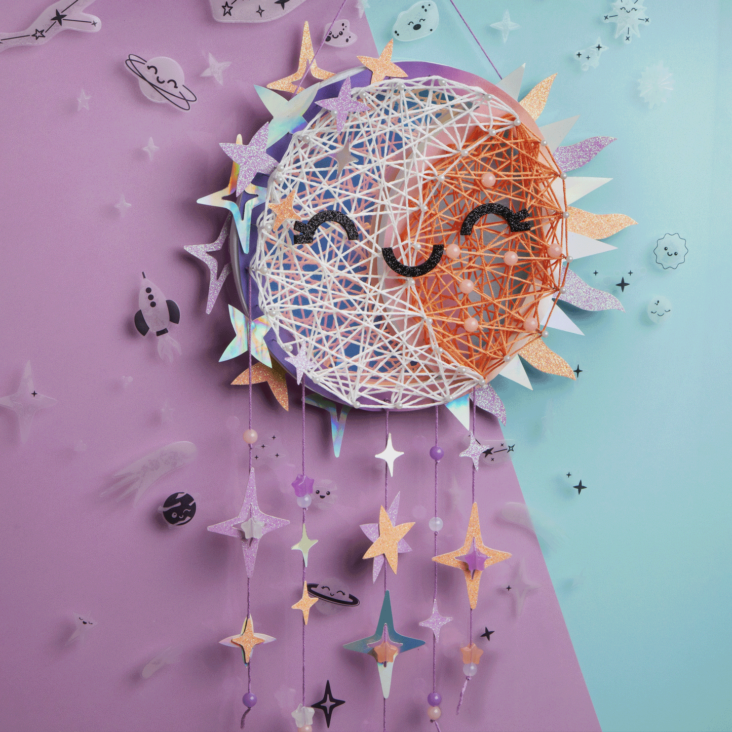 Celestial string art with lights on and off, showing how cling stickers and thread glow in the dark.