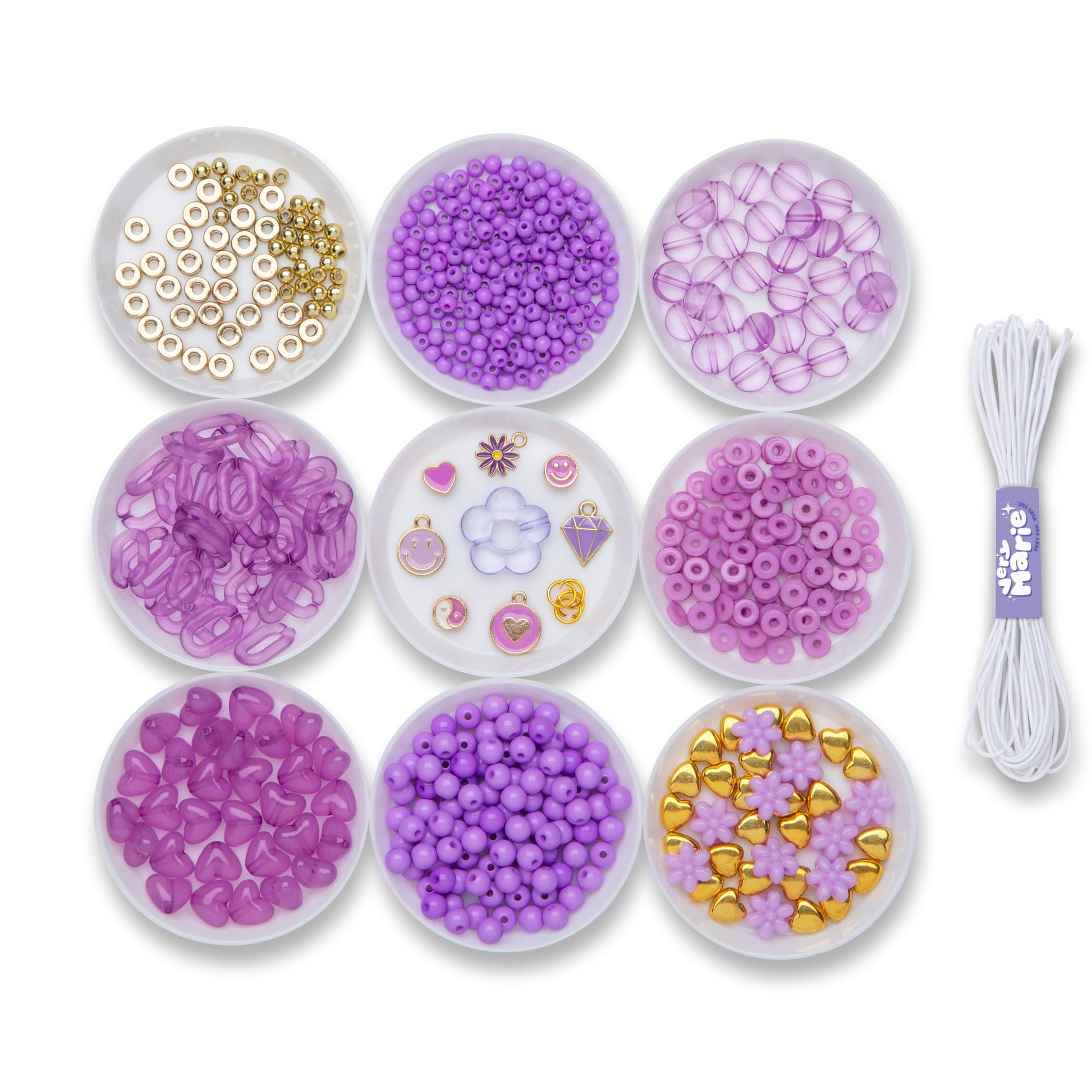 Beads, charms, and elastic that are included in the kit.