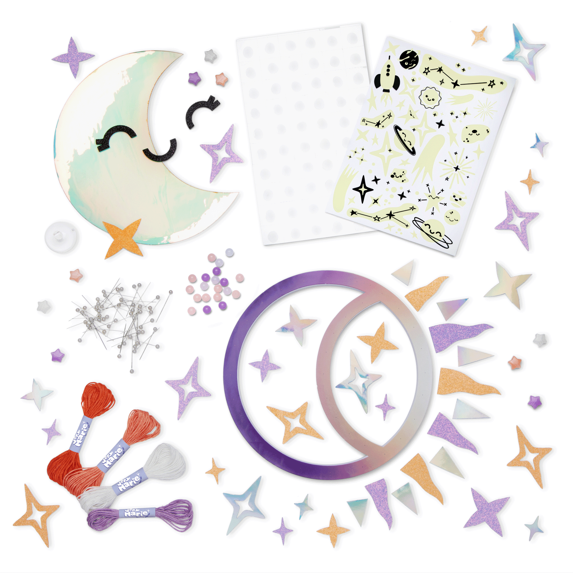 Contents of the string art kit, with "lights off" showing they glow and "lights on" to show the colors and materials.